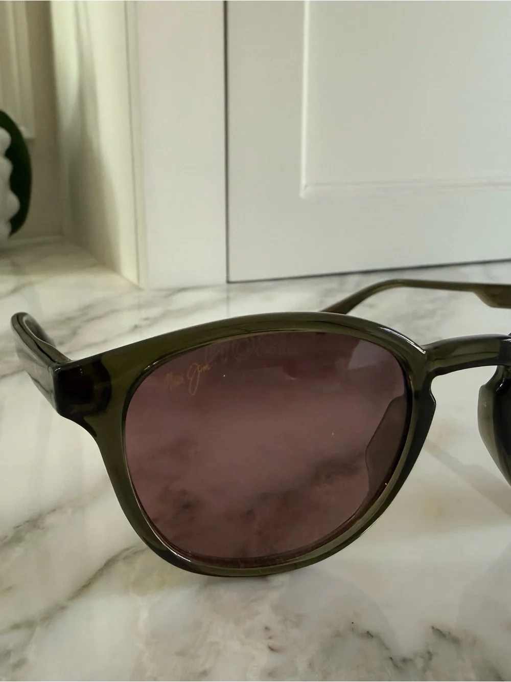 Maui Jim shiny trans green frame with Maui rose frame - polarized